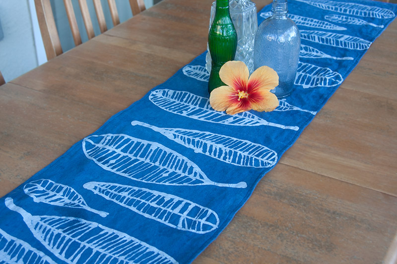 Blue table runner with contrasting motif.